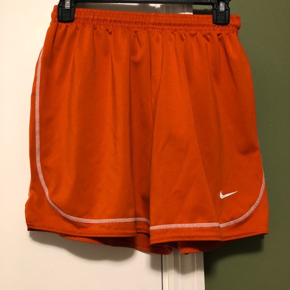 Nike orange soccer/running shorts